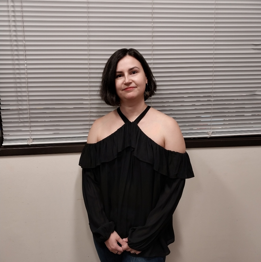 Black, sleeveless blouse